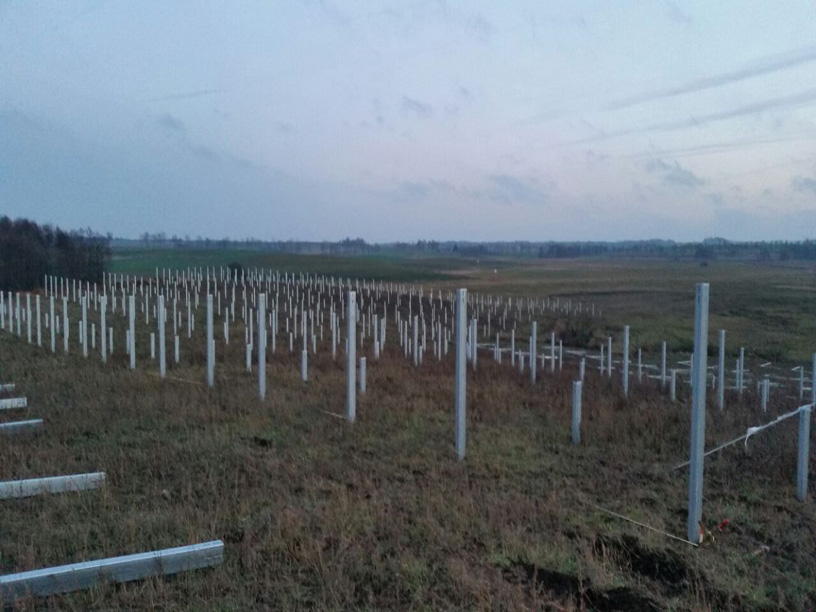 Ground-mounted solar structure installation at the Guja solar project site in Poland